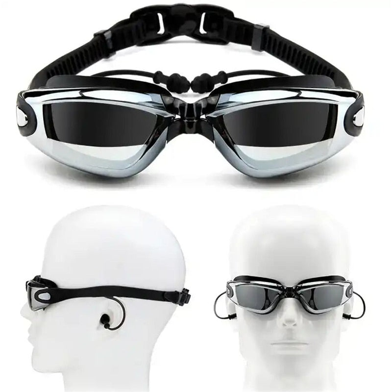 Goggles with attached earplugs